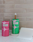 Tissue tolls in bathroom placed in the rob holder with tissues inscrolled. 